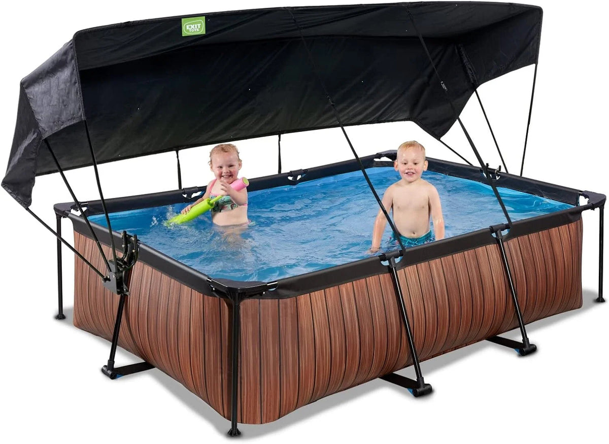EXIT Toys Basen Drewniany z Daszkiem Przeciwsłonecznym - 220x150x65cm - Kompaktowy Basen Stelażowy Prostokątny z Pompą Kartuszową - Optymalna Ochrona UV - Łatwy Dostęp - Unikalny Design - Brązowy