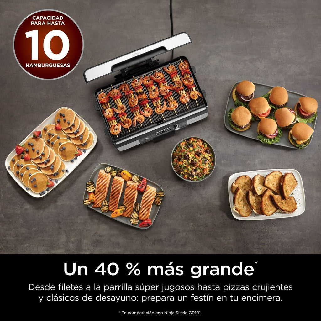 Ninja Sizzle Pro XL grill i płyta grillowa do użytku wewnątrz pomieszczeń z nieprzywierającą ceramiczną płytą grillową, odłączaną pokrywą, pojemnikiem na tłuszcz i książką z przepisami, srebrno-czarny GX101EU